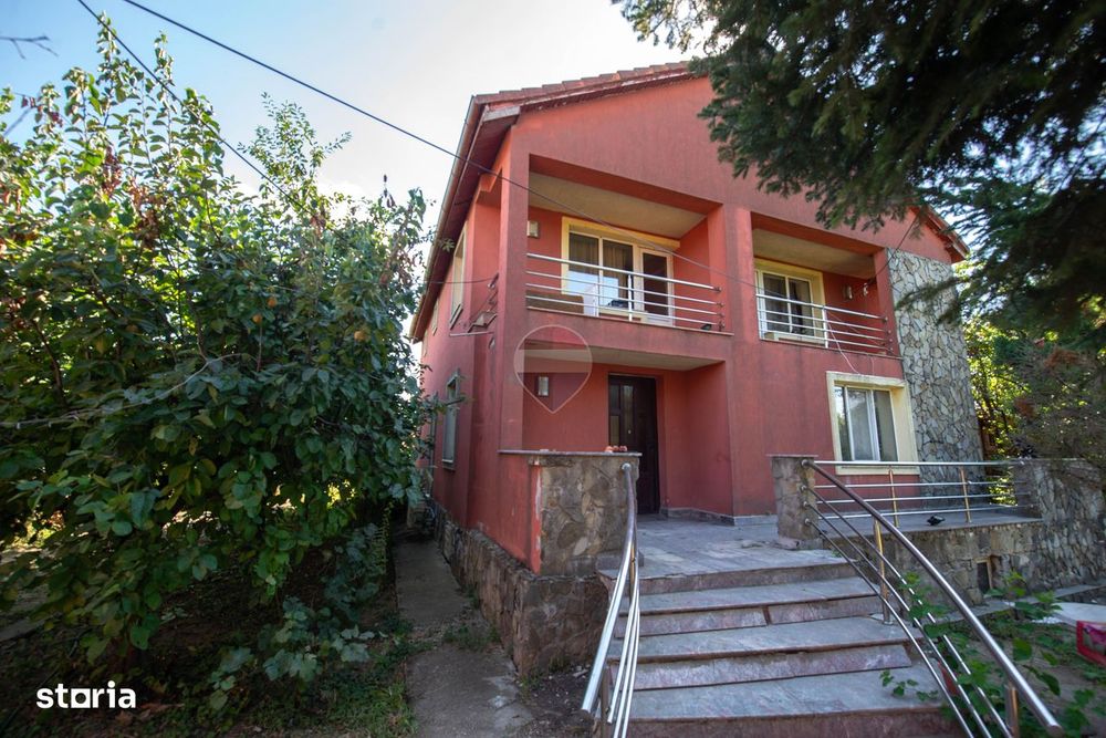 Casa de vanzare 9 camere potential investitie Cornetu teren 1200mp