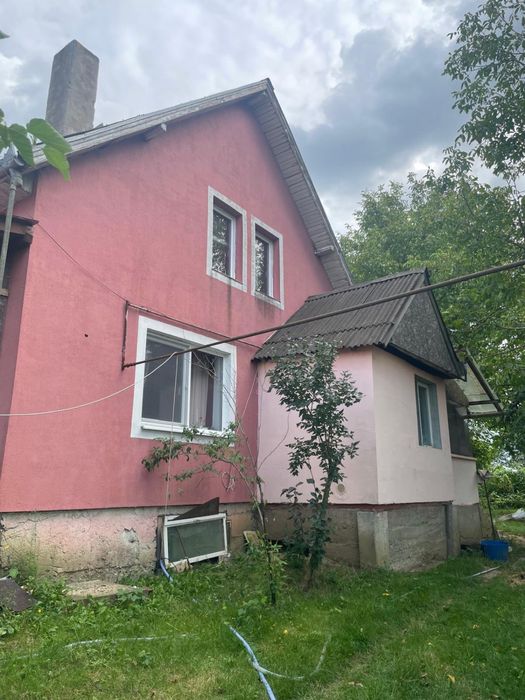 CASA  IN CUCI + 1 ha teren