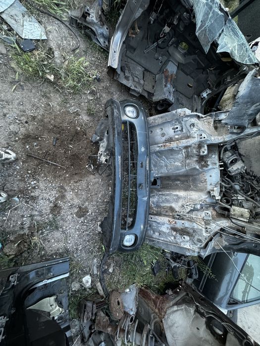 Передний бампер на Mitsubishi Clam 55-й кузов