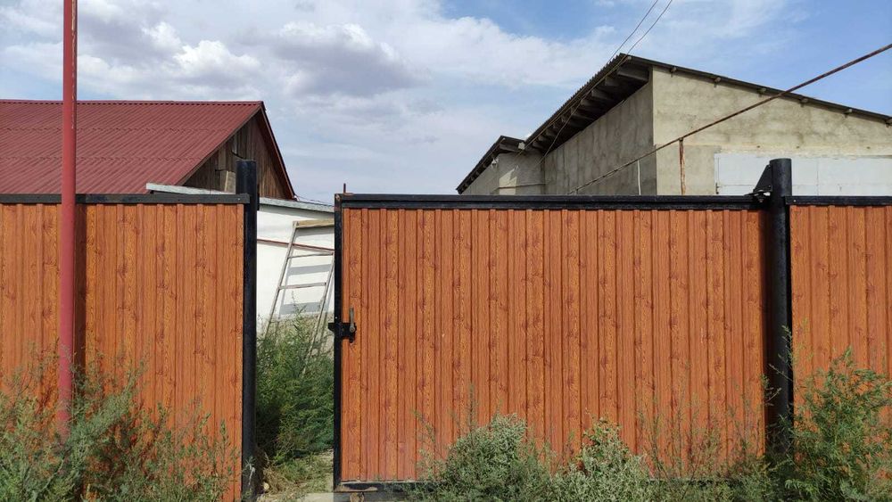 Дом с земельным участком в городе Атырау.