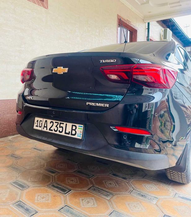 Onix premier 2 turbo AT plus