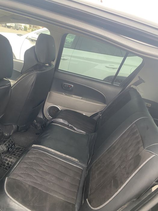 Автомобиль Daihatsu sirion