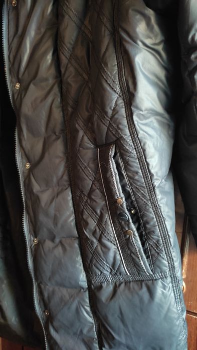 Женская куртка (Размер 62).