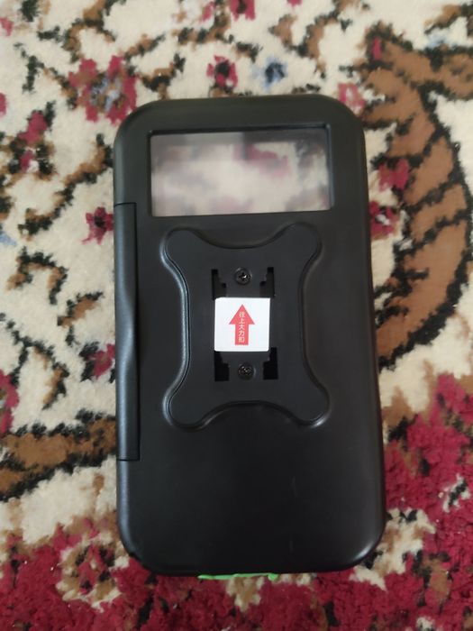 Telefon ushlagich velosiped uchun yomgʻirli havolarga zoʻr