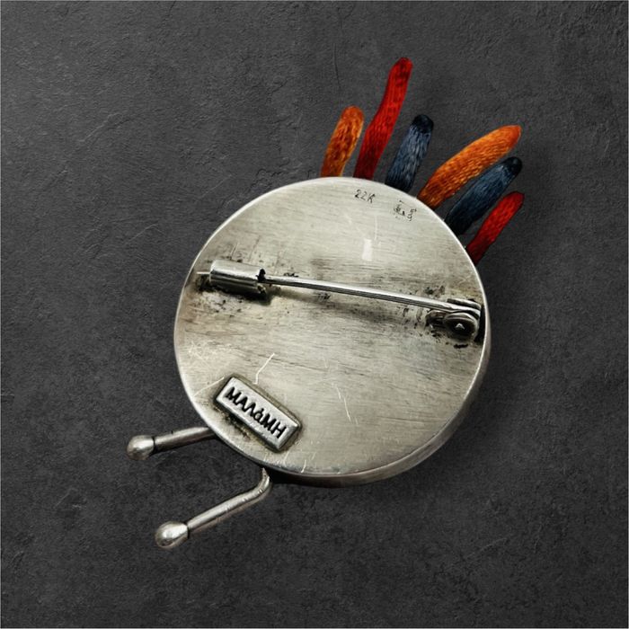 Сребърна брошка с 22к злато и рубини