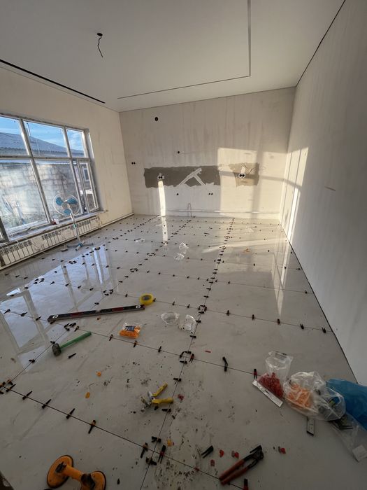 Опытный кафельщик