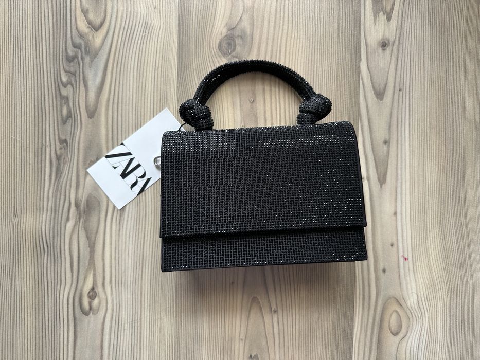 Блестяща черна чанта