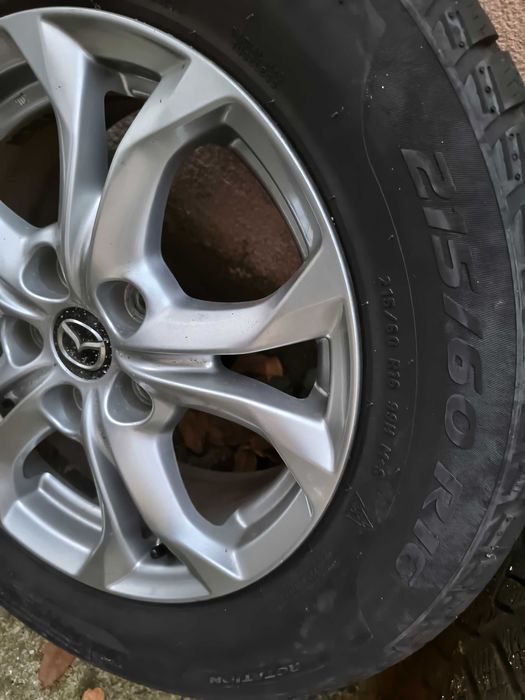 Jante originale Mazda Cx3 cu anvlope de iarna Pirelli Sottozero 3 și anvelope de vara Goodyear (separat).
