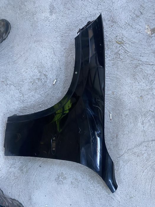 Aripă stânga Bmw x1 e84 mici defecte