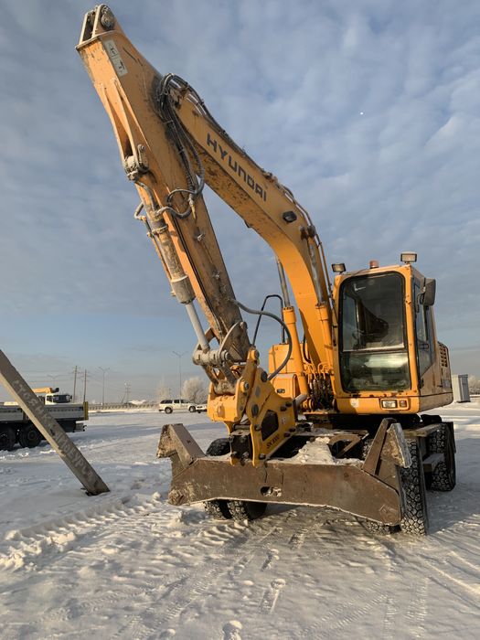 Аренда колесного экскаватора