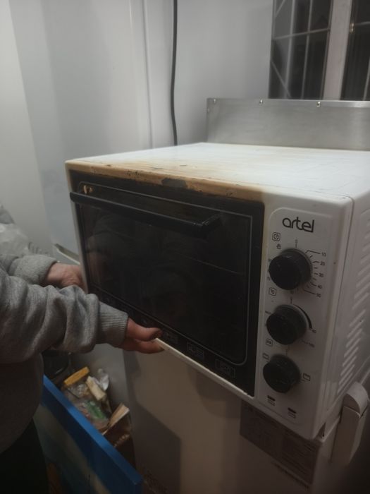 мини-печь Artel.