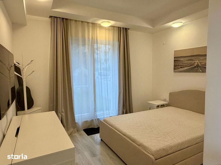 COSMOPOLIS - Apartament cu 3 camere si gradina, mobilat si utilat.