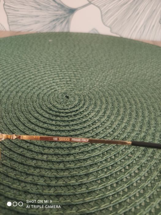 Ochelari Gucci cu lentilă heliomată