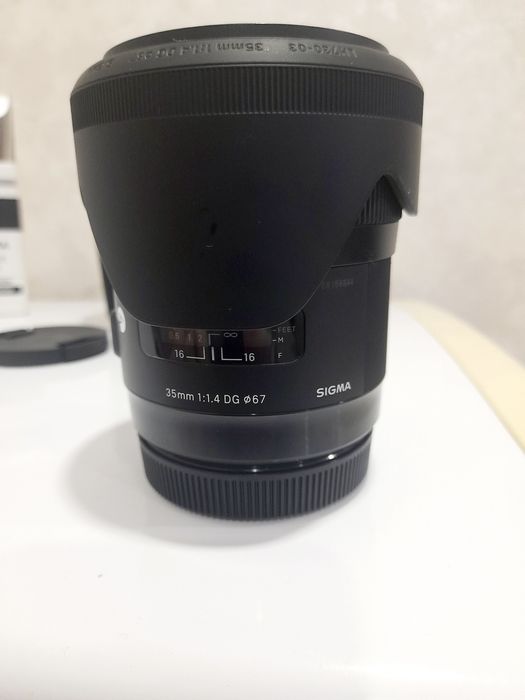 Продам объектив SIGMA 35мм F1.4DG