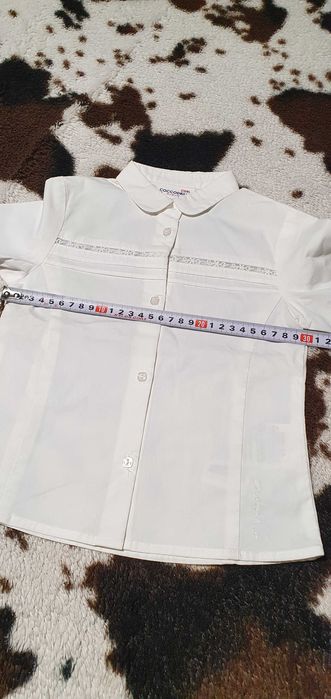 Бяла ризка с дантелка Coccodrilo р-р 2г