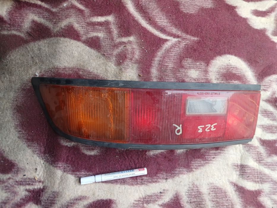 Фонарь Мазда 323F