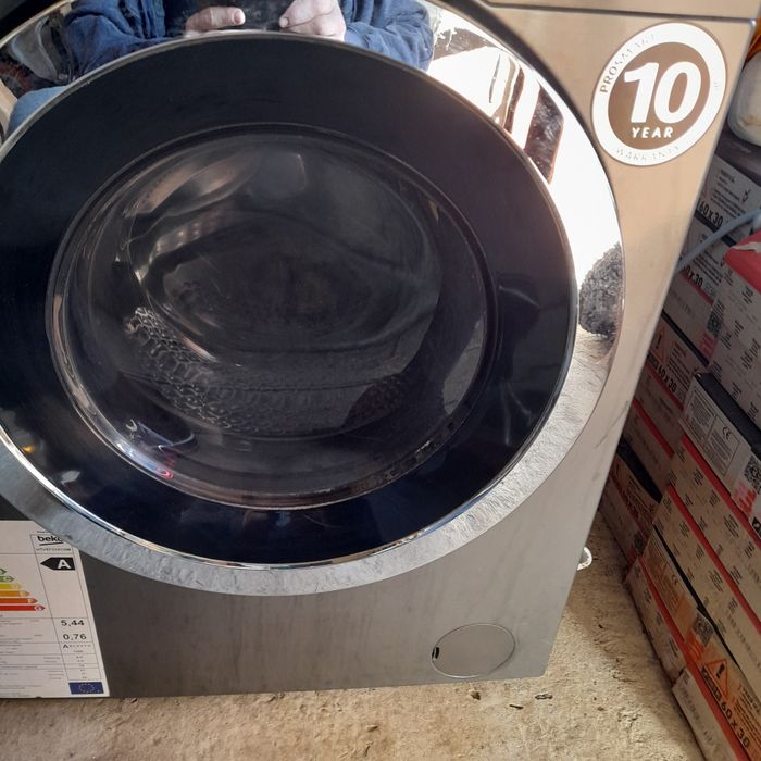Masina de spalat haine  cu uscator  Beko