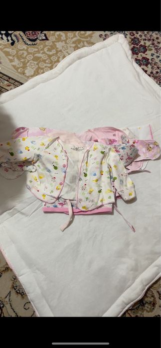 Одежды для новорожденных