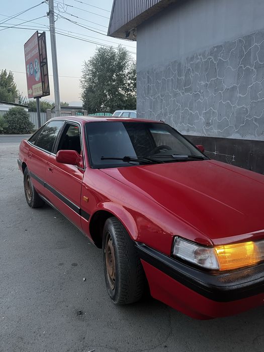 Мазда 626.