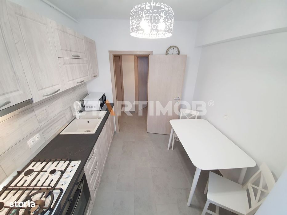 Apartament mobilat 3 camere cu parcare subterana