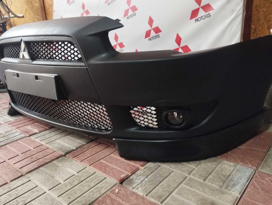 Бампер передний Лансер