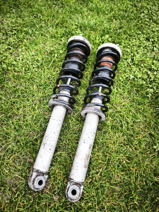 Set 2 amortizoare/telescoape spate BMW E60+arcuri+flanse