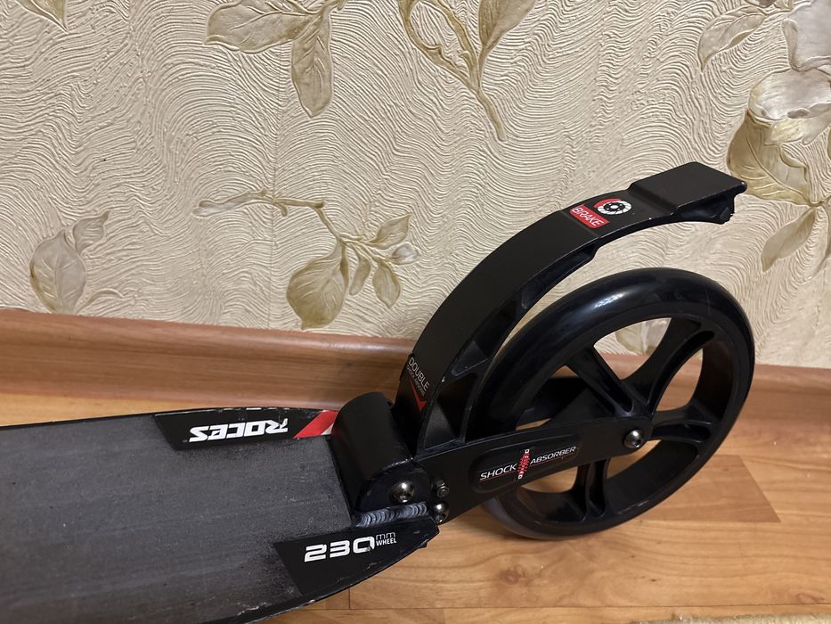 Продам самокат ROCES 230