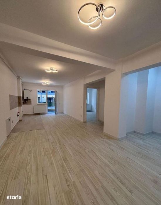 Apartament 2 camere|55 mp|Zona Terra|Parcare subterana inclusa — fotografia 1