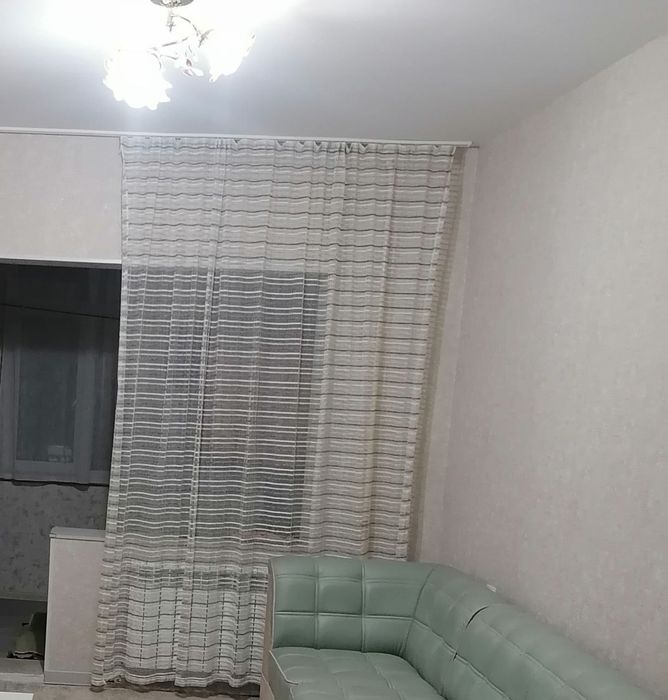 Тюлевая занавеска