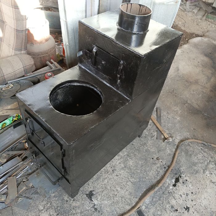 Печь на угле для дома