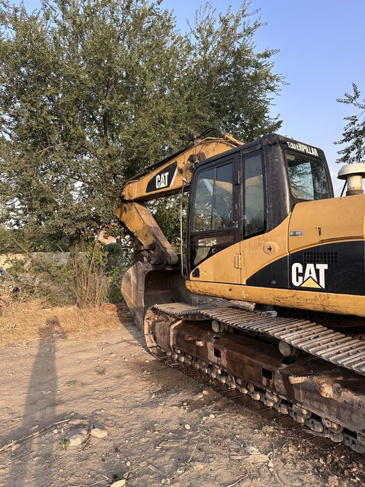 Экскаватор CAT 325 DL