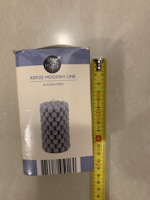 Vand lumanari rosii si gri si aurii