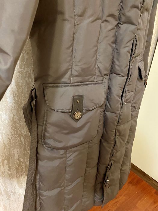 Женский пуховик , куртка . Коричневого цвета