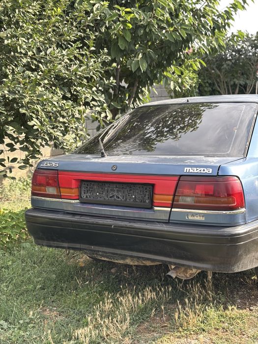 Мазда 626 синий.