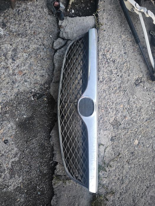 Решетка радиатора на Мазда 626 птичка