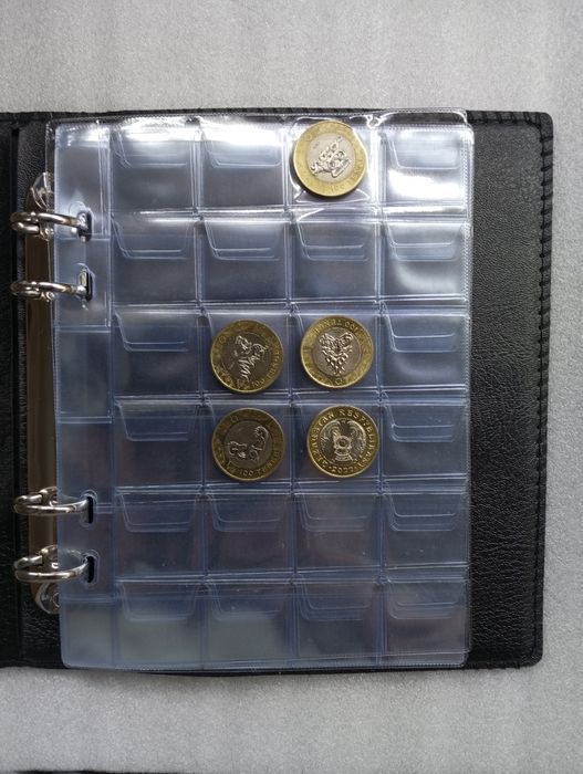 Альбом для монет. Новый! (на 480шт)