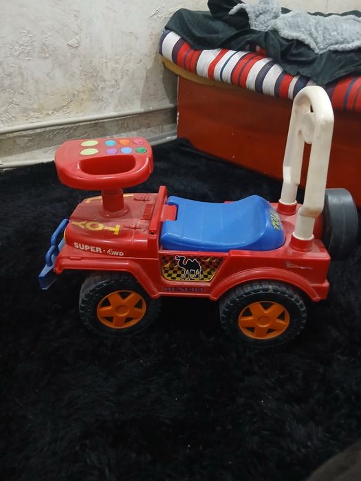 Машинка каталка бу