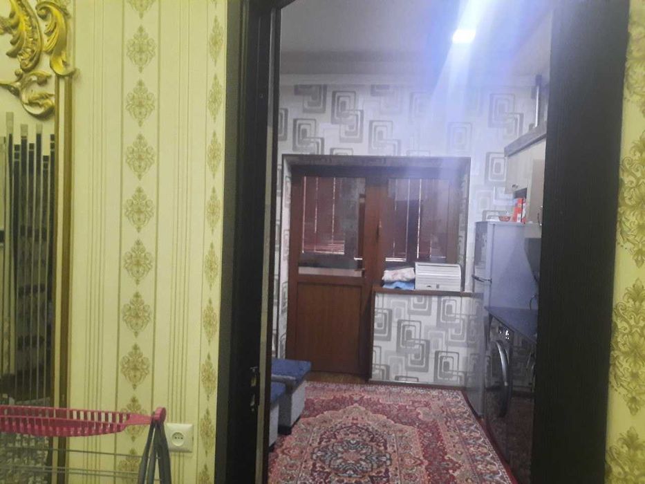 Ko`p qavatli uydagi xonadon