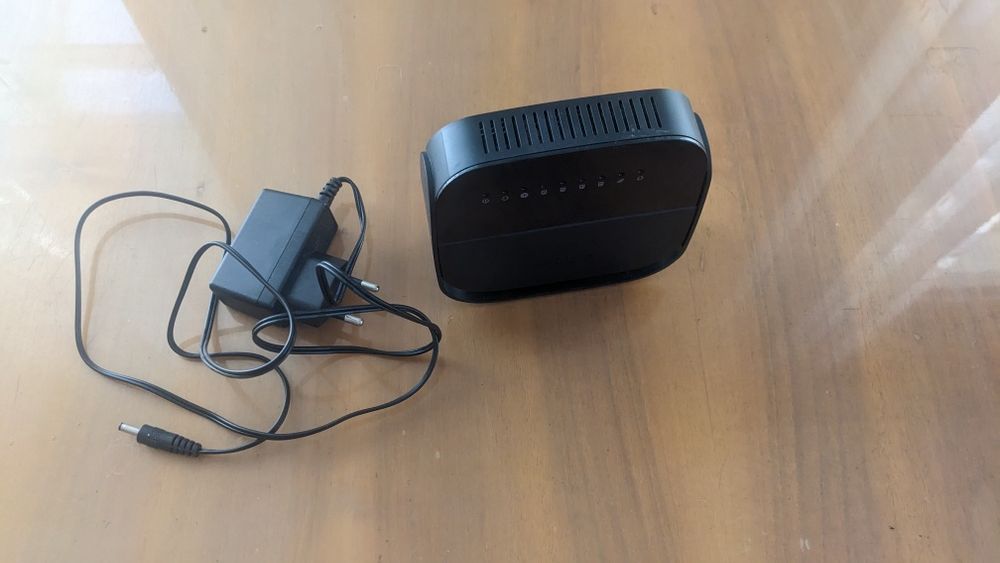 Отдам старый модем D-Link