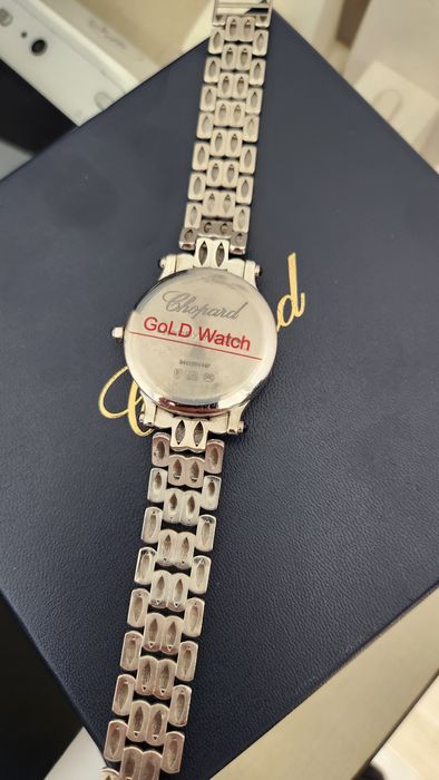 Золотые женские часы Chopard