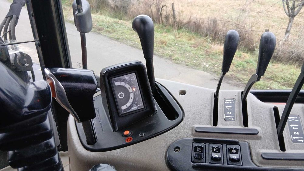 Tractor casse maxxum 125 cu încărcător frontal  anul 2010