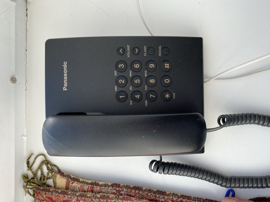 Продам телефон новый синего цвета