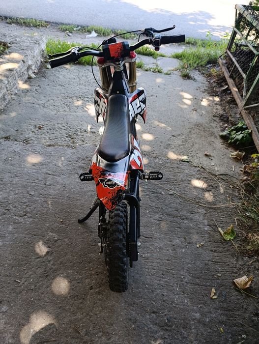 Motocicleta electrica copii Eco Tiger 1000W pentru copii 6-12 ani, 36V, roti 12/10, culoare portocalie, ideala pentru aventuri off-road