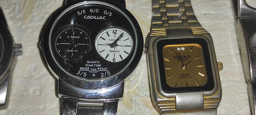 11 ceasuri de mana toate quartz cele din poza vre-o 4 dintre ele nu au fost probate NECESI
