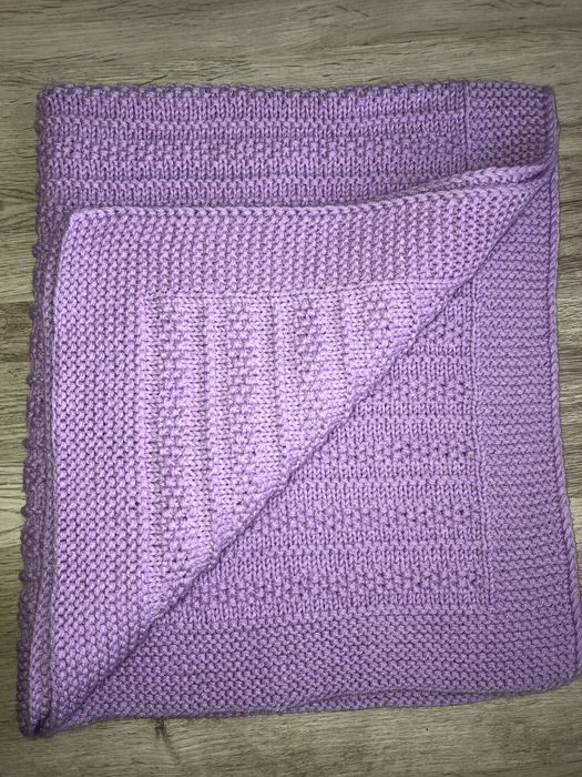 Ръчно изплетено бебешко одеяло
