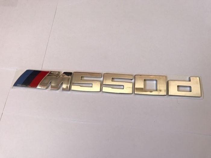 Emblema BMW M550d