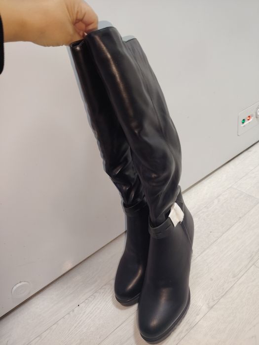 Продам новые сапоги