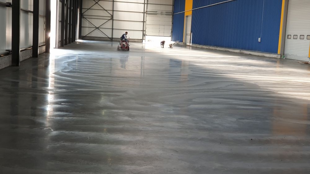 Turnare Beton finisat mecanic  cu elicopter si cuarț, Șapa industriala