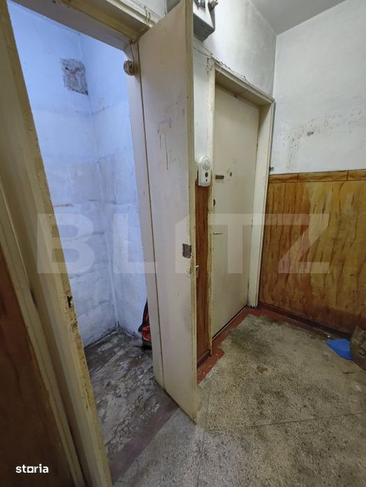 Apartament cu 2 camere la parter- nerenovat, 60 mp, zona Centru