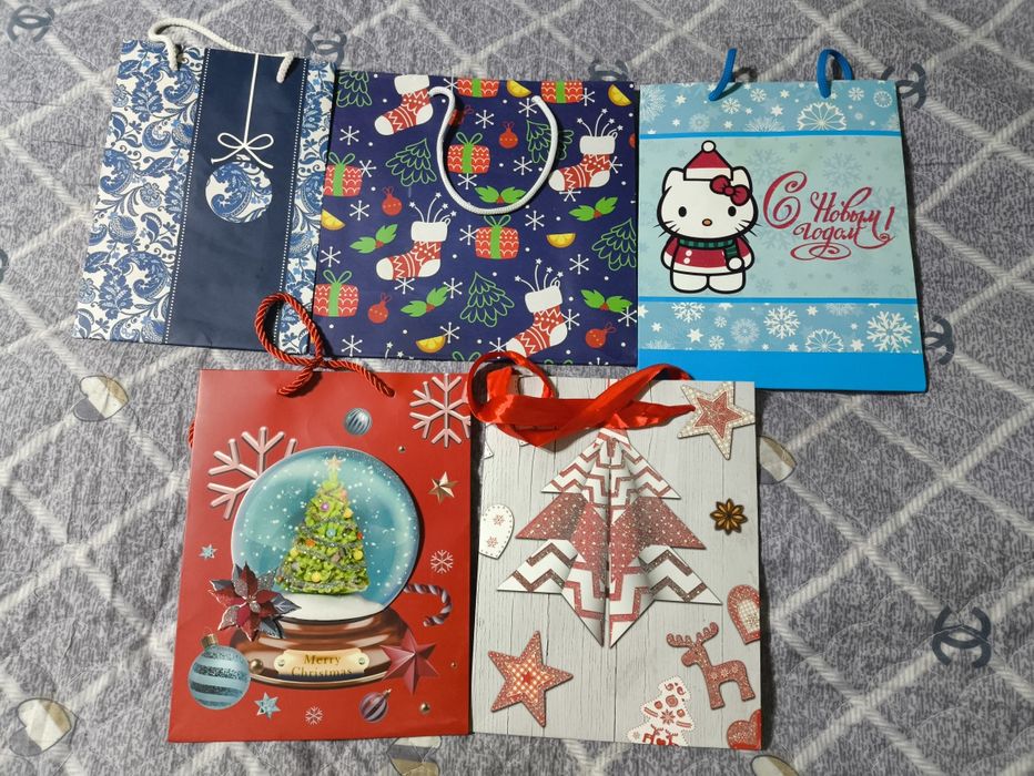 Подарочные  и брендовые бумажные пакеты